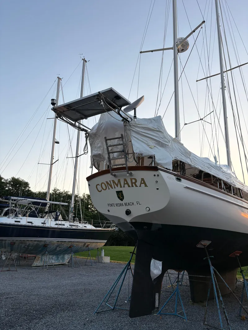 Slide: The Image of Sailboat "Conmara" on land, Shannon Aegean 51, 1984, at sunset in a boatyard. - 36