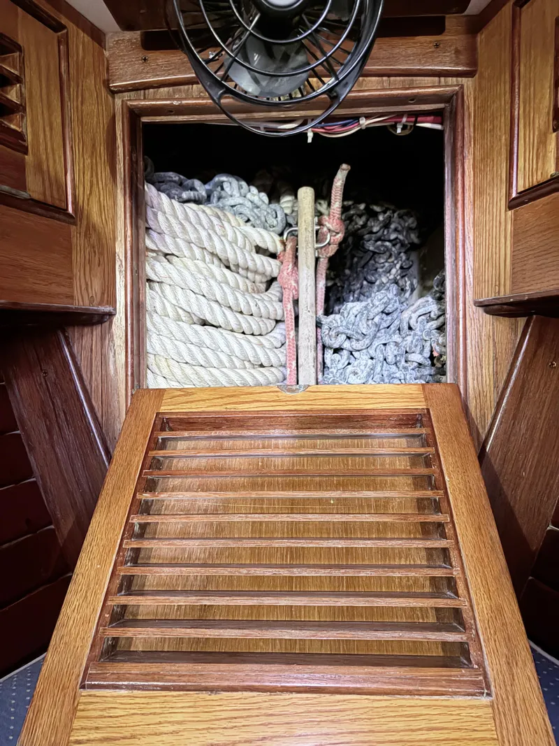 Slide: The Image of Interior of 1984 Shannon Aegean 51 sailboat with ropes and wooden hatch. - 4