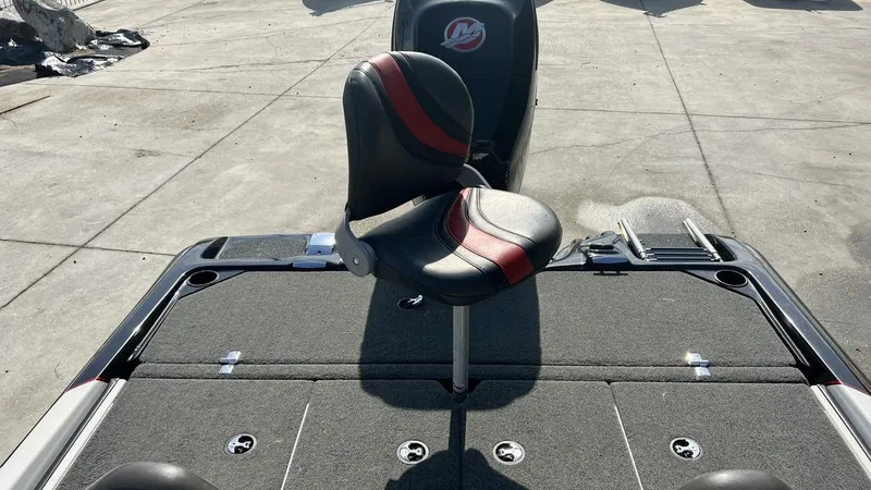 Slide: The Image of 2018 Bass Cat Pantera Classic boat with a black and red seat. - 11