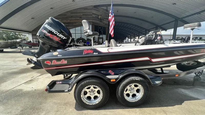 Slide: The Image of 2018 Bass Cat Pantera Classic boat with Mercury engine on trailer. - 12