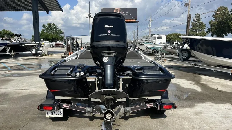 Slide: The Image of 2018 Bass Cat Pantera Classic boat with Pro outboard motor at a marina. - 8