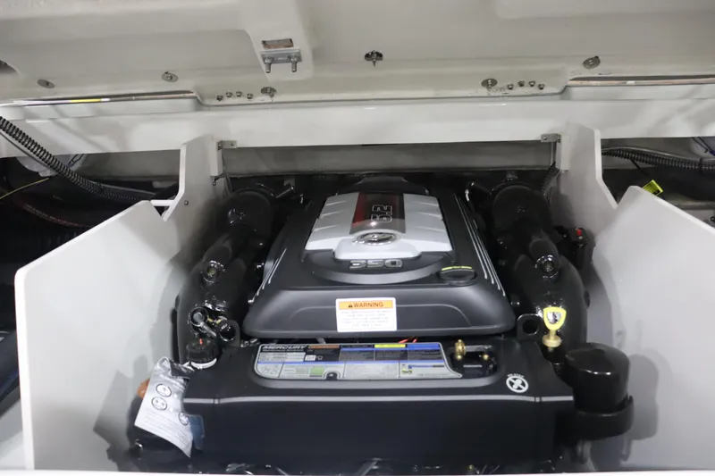 Slide: The Image of 2023 Crownline 240SS boat engine compartment. - 15