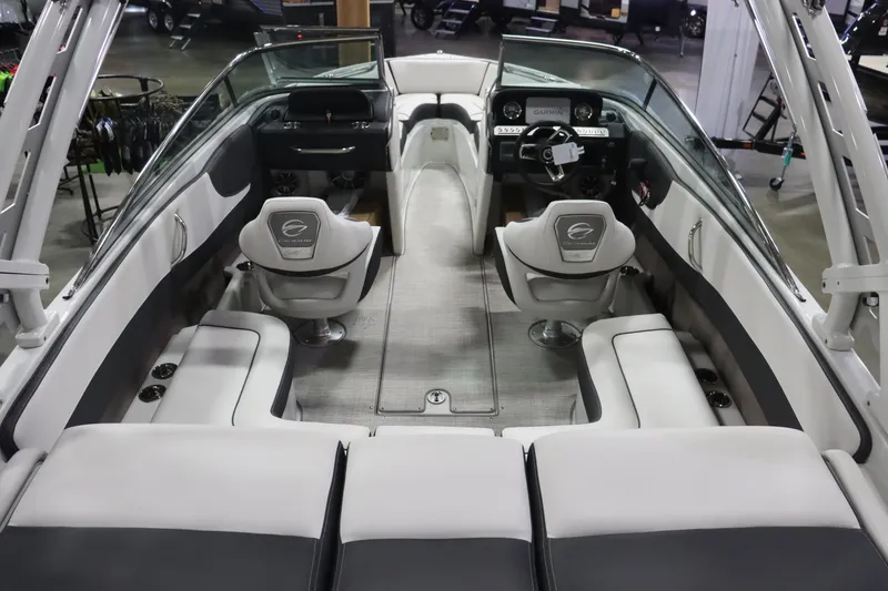 Slide: The Image of 2023 Crownline 240SS boat interior with modern seating and dashboard. - 6