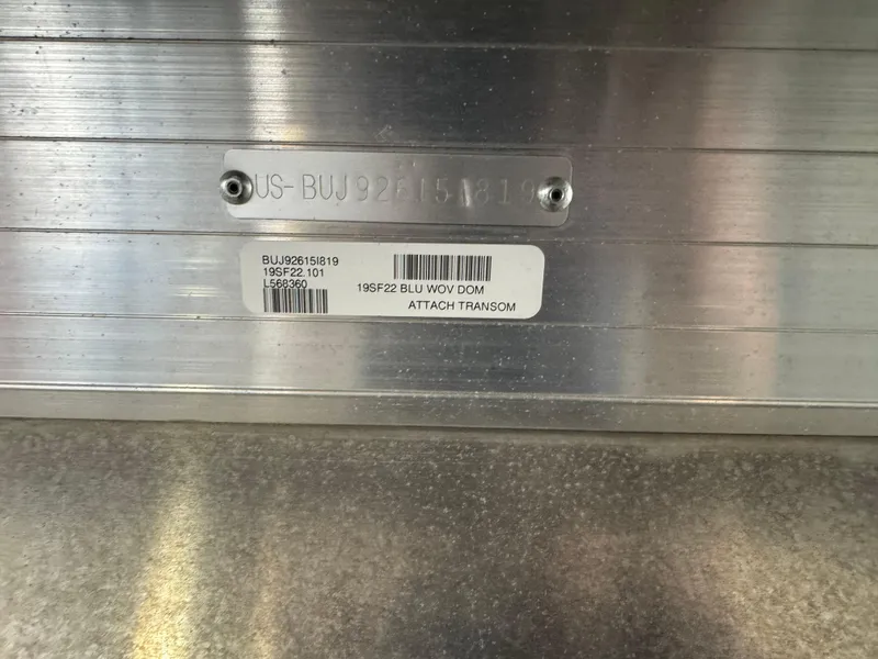 Slide: The Image of 2019 Sun Tracker SportFish 22 DLX identification plate with serial number and barcode. - 3