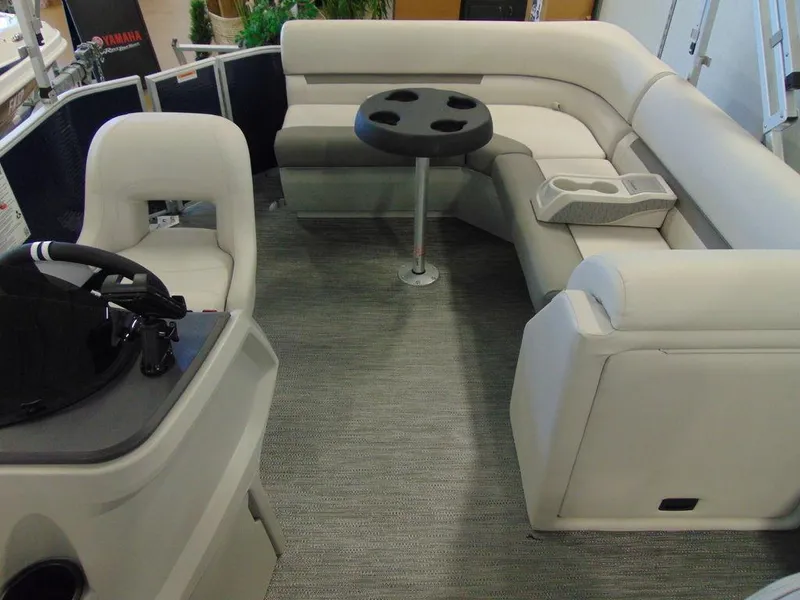 Slide: The Image of 2023 Godfrey Sweetwater Xperience 1680 FX interior with seating and table. - 4