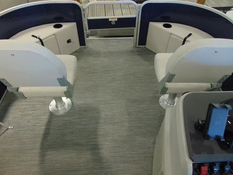 Slide: The Image of Interior of 2023 Godfrey Sweetwater Xperience 1680 FX pontoon boat with seating and control panel. - 6