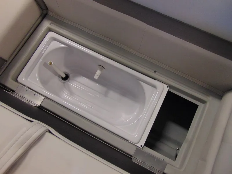 Slide: The Image of Livewell compartment in 2023 Godfrey Sweetwater Xperience 1680 FX pontoon boat. - 7