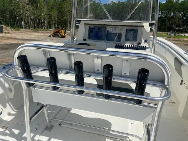 Slide: The Image of 2004 Fountain 34 CC boat console with rod holders and navigation equipment. - 15