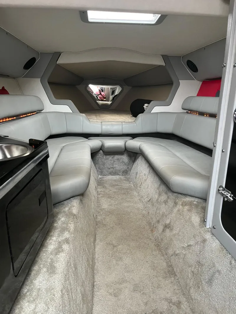 Slide: The Image of Luxurious interior of a 1992 Fountain 42 Lightning boat with plush seating and modern amenities. - 12