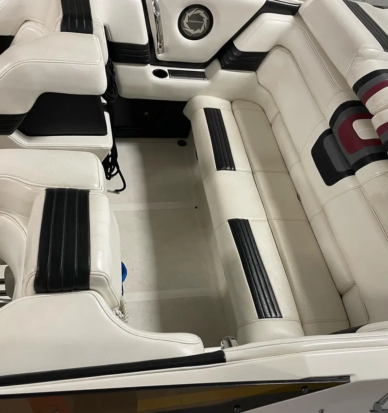 Slide: The Image of Interior of a 1992 Fountain 42 Lightning boat with white and black seating. - 7