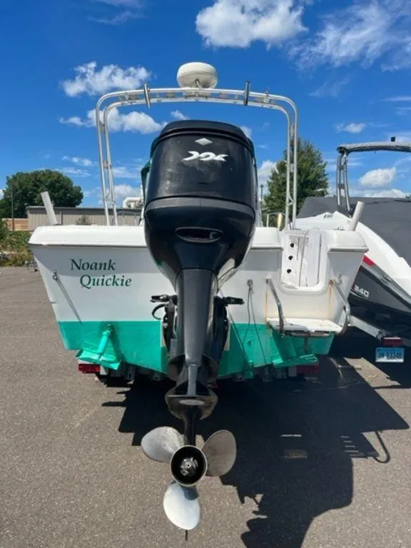 Slide: The Image of 2001 Pro-Line 25 Walkaround boat with outboard motor, named Noank Quickie. - 15
