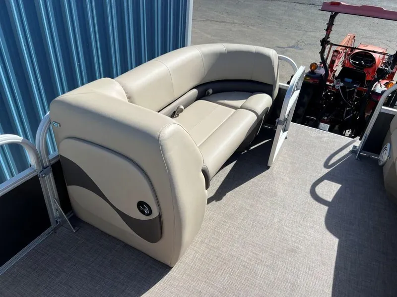 Slide: The Image of 2023 Sun Tracker PARTY BARGE® 18 DLX interior seating area with beige upholstery. - 4