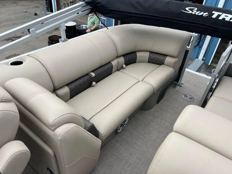Slide: The Image of 2023 Sun Tracker PARTY BARGE® 22 RF XP3 interior seating area with beige upholstery. - 4