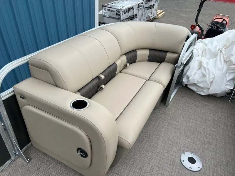 Slide: The Image of 2023 Sun Tracker PARTY BARGE® 22 RF XP3 beige seating area with cup holder. - 6