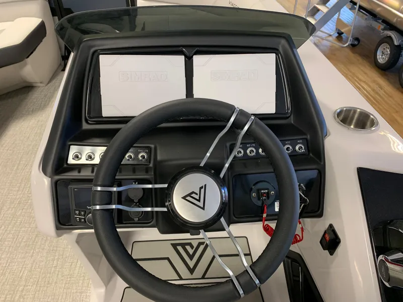 Slide: The Image of 2023 Viaggio Diamante 21U boat dashboard with steering wheel and control panel. - 8