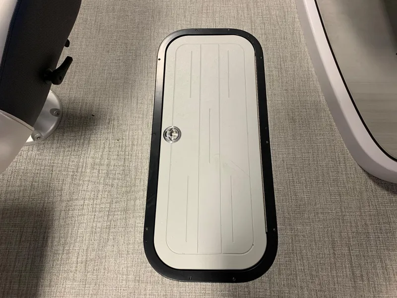 Slide: The Image of Hatch door on the floor of a 2023 Viaggio Diamante 21U boat. - 9