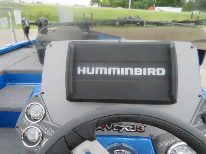 Slide: The Image of 2023 Vexus AVX 181 boat dashboard with Humminbird display and gauges. - 10
