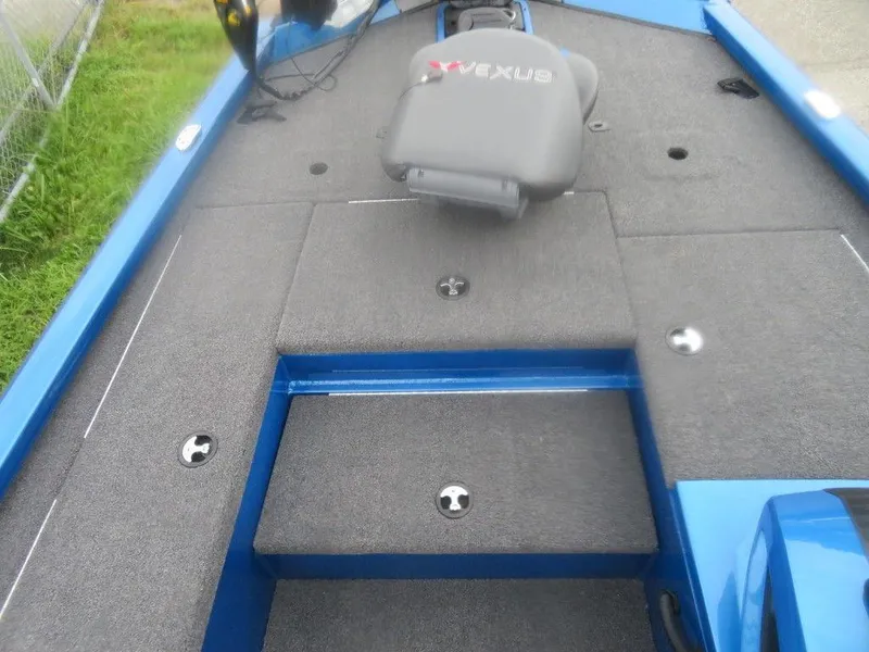 Slide: The Image of 2023 Vexus AVX 181 boat interior with storage compartments and seating. - 14