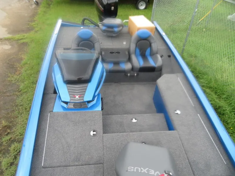 Slide: The Image of 2023 Vexus AVX 181 boat interior with blue and black seating. - 16