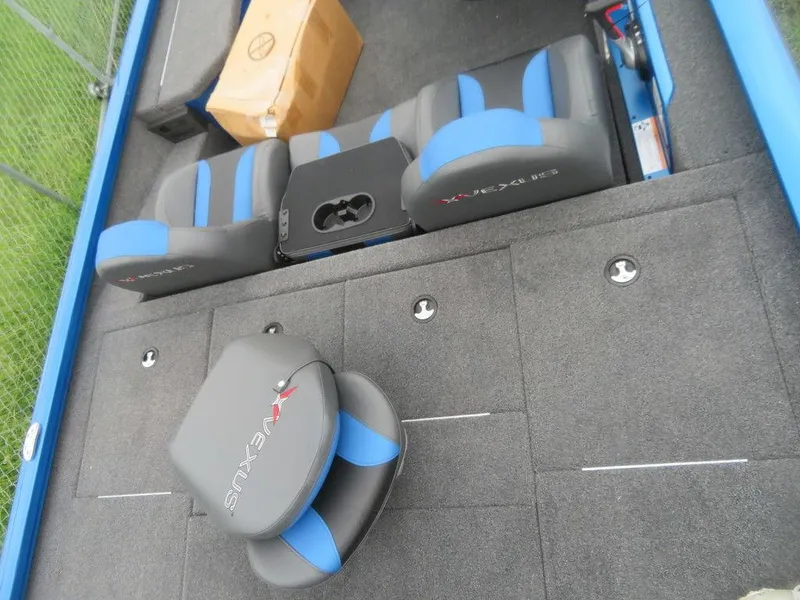 Slide: The Image of 2023 Vexus AVX 181 boat interior with blue and gray seating. - 5