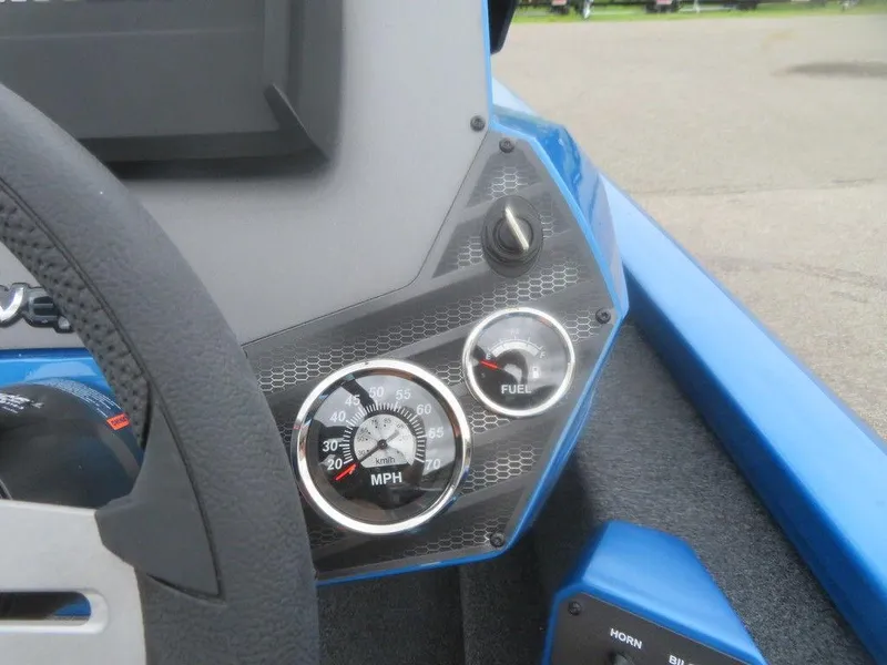 Slide: The Image of 2023 Vexus AVX 181 boat dashboard with speedometer and fuel gauge. - 9