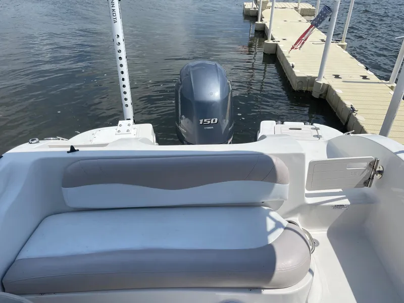 Slide: The Image of 2018 Starcraft 2000 OB Limited boat with Yamaha 150 engine at dock. - 10