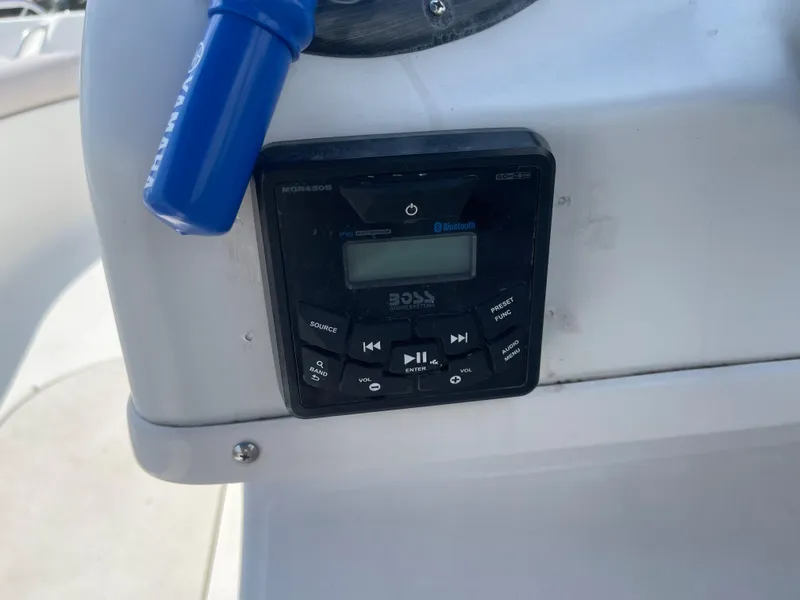 Slide: The Image of 2018 Starcraft 2000 OB Limited boat stereo system with Bluetooth connectivity. - 15
