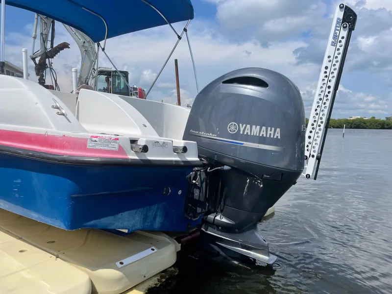 Slide: The Image of 2018 Starcraft 2000 OB Limited boat with Yamaha outboard motor on water. - 5