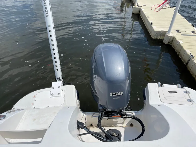 Slide: The Image of 2018 Starcraft 2000 OB Limited boat with 150 HP outboard motor at dock. - 8