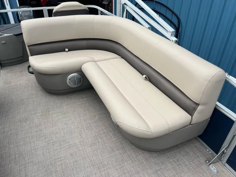 Slide: The Image of 2023 Sun Tracker BASS BUGGY® 18 DLX pontoon boat seating area with beige upholstery. - 3