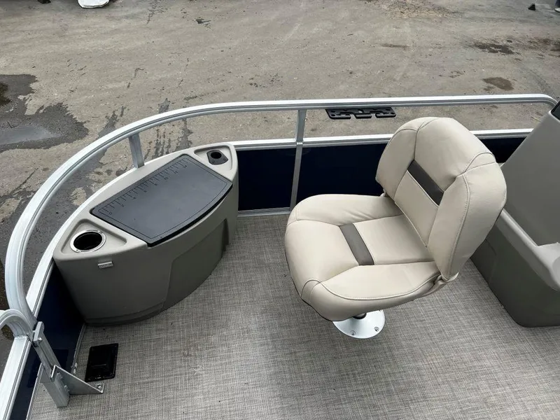 Slide: The Image of 2023 Sun Tracker BASS BUGGY® 18 DLX front seating and storage area. - 6