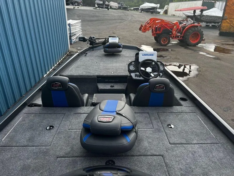 Slide: The Image of 2023 Ranger RT198P fishing boat interior with seats and steering console. - 5