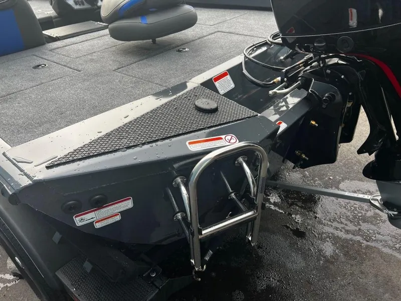 Slide: The Image of 2023 Ranger RT198P boat stern with ladder and motor. - 8
