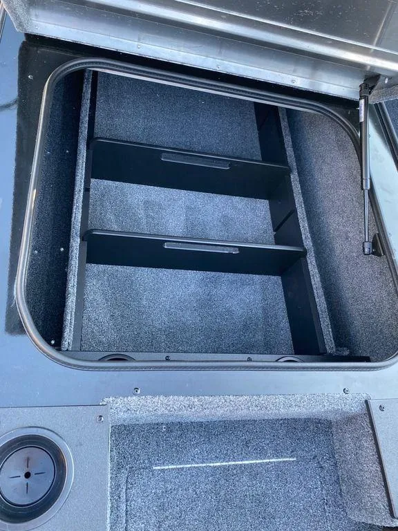 Slide: The Image of 2023 Tracker Pro Team 175 TF® storage compartment with open lid. - 15