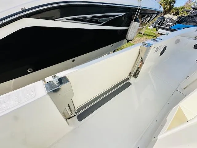 Slide: The Image of 2023 Boston Whaler 280 Dauntless boat interior with sleek seating and modern design. - 15