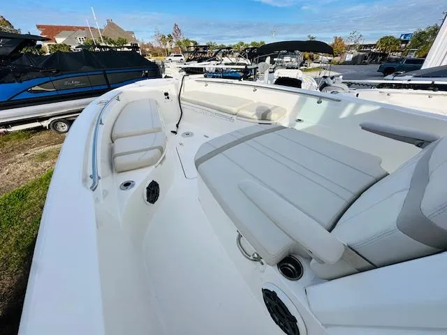 Slide: The Image of 2023 Boston Whaler 280 Dauntless boat interior with spacious seating and sleek design. - 23