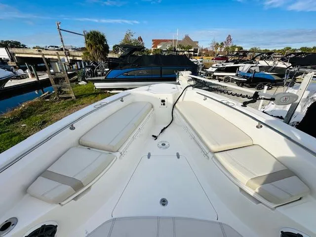 Slide: The Image of 2023 Boston Whaler 280 Dauntless boat interior with spacious seating and sleek design. - 26