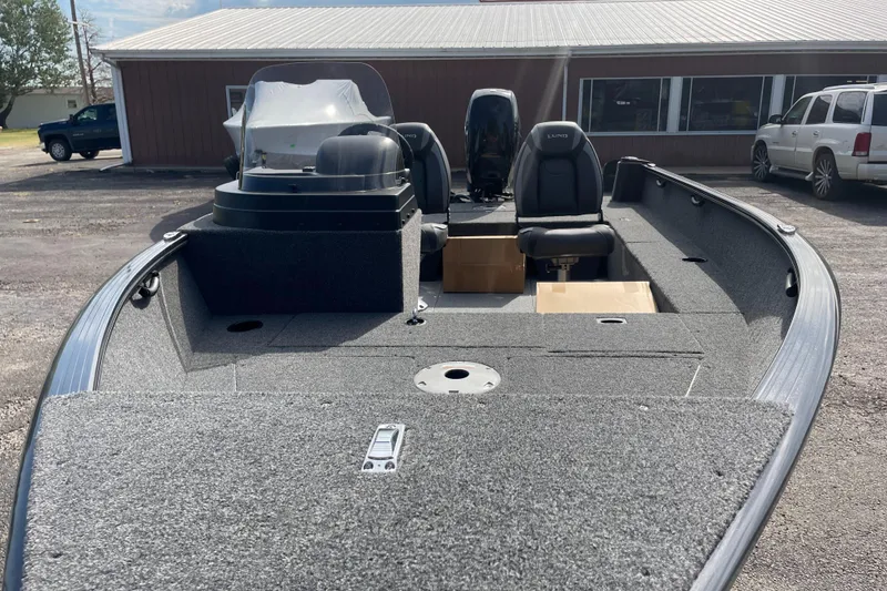 Slide: The Image of 2025 Lund 1650 Rebel XL SS fishing boat with seating and console. - 4