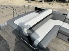 Slide: The Image of 2023 Sweetwater 2286SFL pontoon boat with gray and white seating. - 3