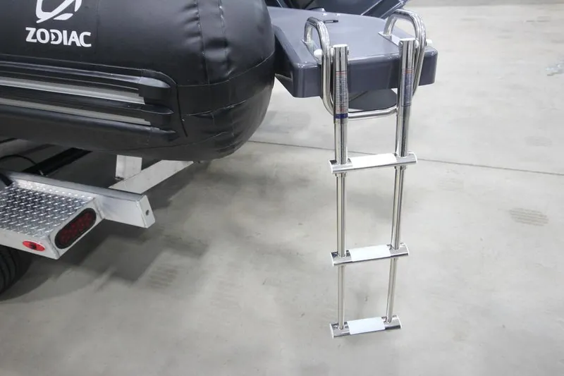 Slide: The Image of 2023 Zodiac Open 5.5 PVC boat with 115hp, T-Top, on trailer, in stock. - 3