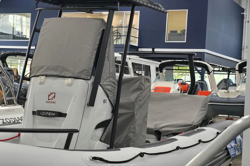 Slide: The Image of 2023 Zodiac Open 5.5 PVC boat with T-Top, 115hp, in showroom. - 22
