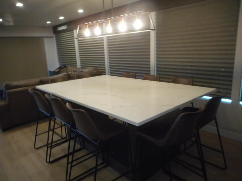 Slide: The Image of Modern dining area in Adonia Pace Share #8 RV, 2021 model, with large table and stylish chairs. - 11