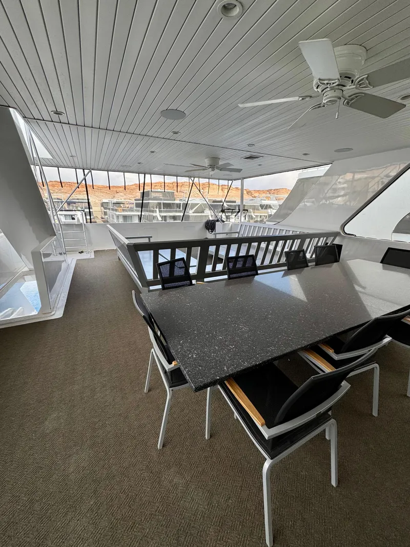 Slide: The Image of Modern yacht interior with sleek dining area, featuring Adonia Pace Trip #7, 2021 model. - 34