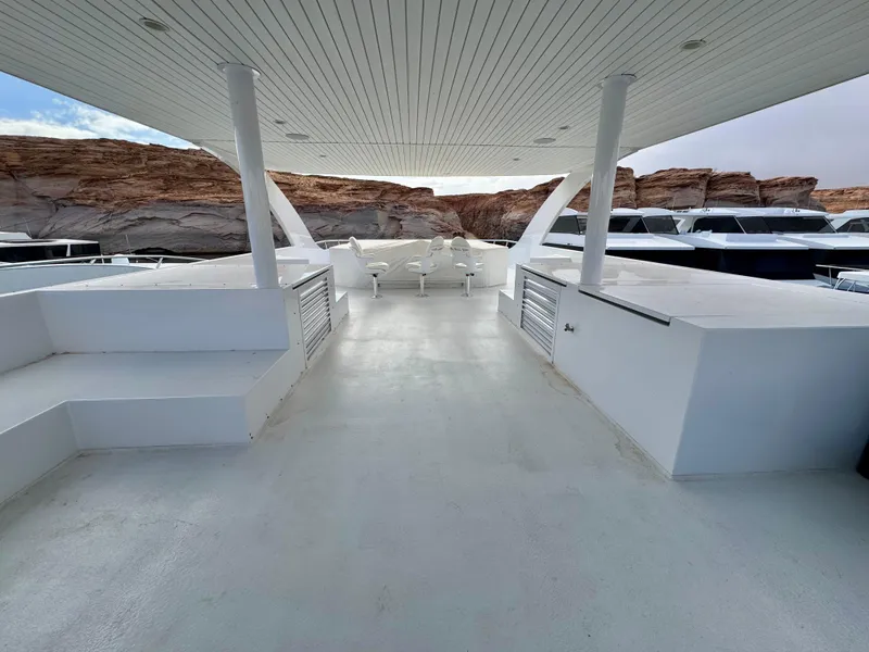 Slide: The Image of Spacious deck of 2021 Adonia Pace Trip #7 houseboat with scenic canyon backdrop. - 42