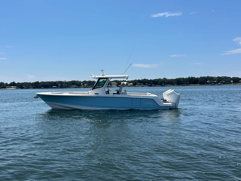 Slide: The Image of Boston Whaler 330 Outrage 2026 - 1