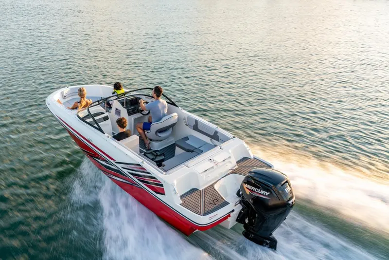 Slide: The Image of 2023 Bayliner M17 boat cruising on water with passengers. - 3