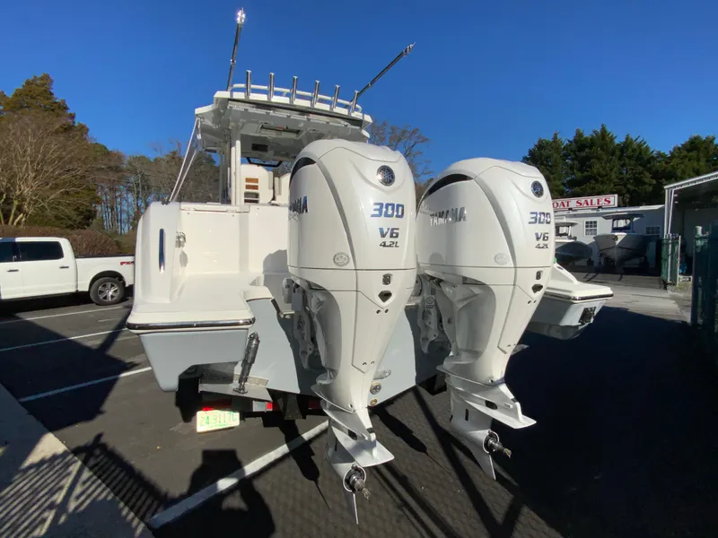 Slide: The Image of 2024 Pursuit S 328 Sport boat with twin Yamaha 300 V6 outboard engines. - 10