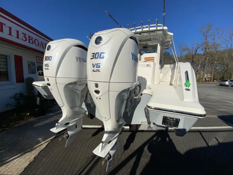 Slide: The Image of 2024 Pursuit S 328 Sport boat with twin Yamaha 300 V6 engines. - 11