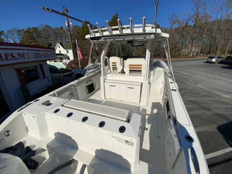 Slide: The Image of 2024 Pursuit S 328 Sport boat with spacious deck and seating. - 19