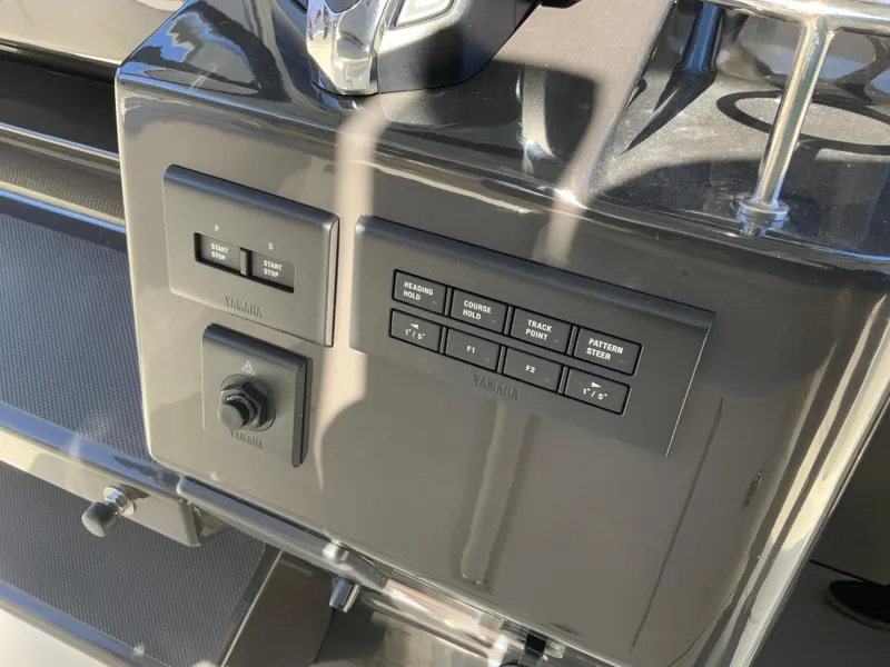 Slide: The Image of Control panel of the 2024 Pursuit S 328 Sport boat. - 41